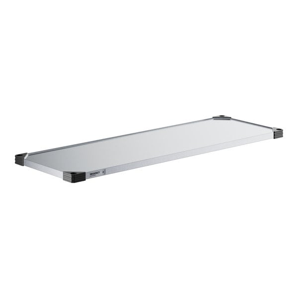 A white rectangular Regency galvanized steel wall shelf.