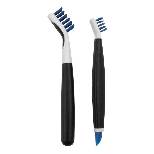An OXO Good Grips deep clean brush set with blue handles and black bristles.