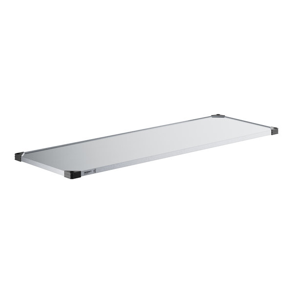 A white rectangular galvanized steel wall shelf with black corners.