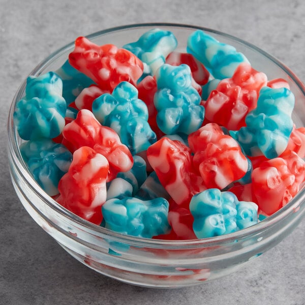 A bowl of Albanese Peace Gummi Bears on a counter.