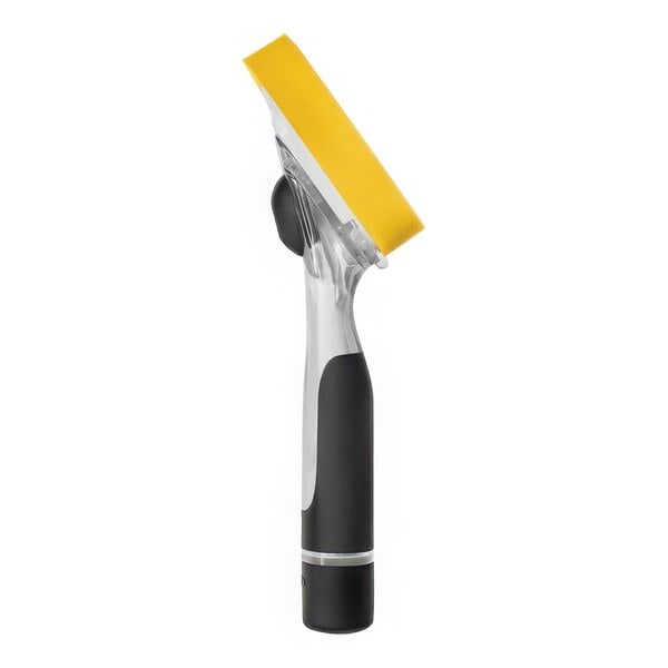 A yellow and black OXO Good Grips soap dispensing dish sponge.
