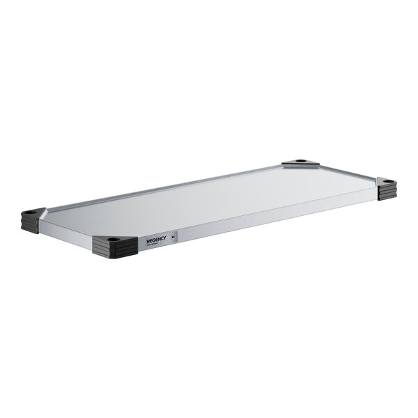 A white rectangular Regency galvanized steel wall shelf with black trim.