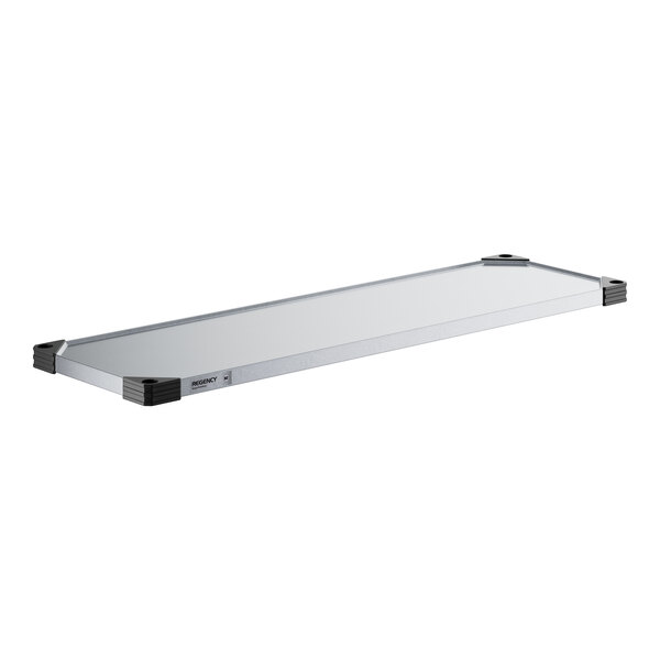 A white rectangular Regency galvanized steel wall shelf.