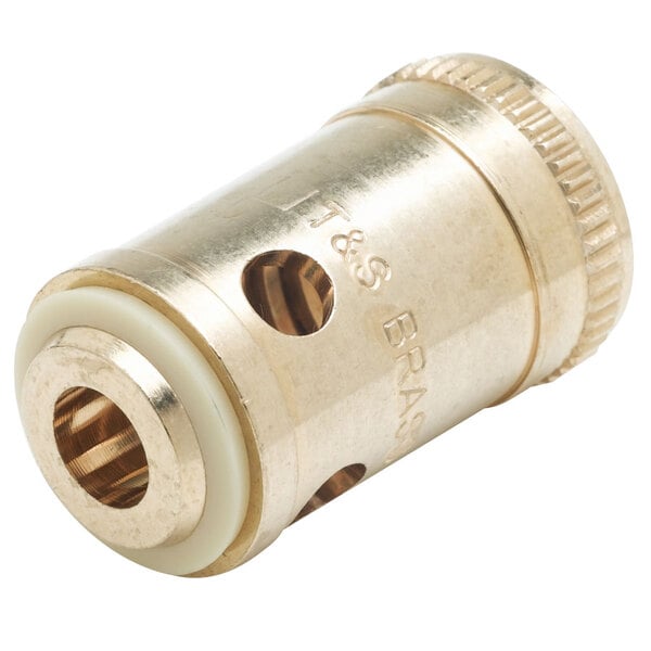 A brass threaded insert with a hole in it.