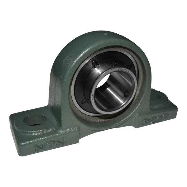 A close-up of a metal Canarm pillow block bearing with a round center.