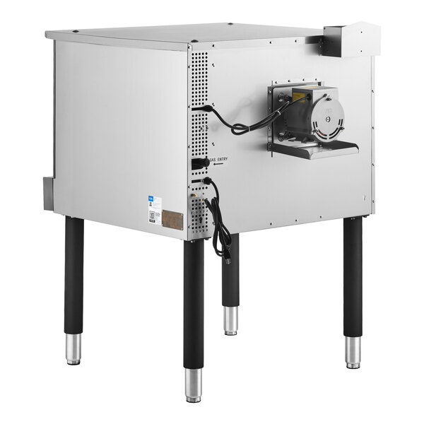 A stainless steel commercial kitchen appliance with four black legs, a visible electric motor on the back, and power cords hanging down.