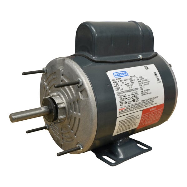 A cylindrical electric motor with a metal mounting base, protruding shaft, and a label with technical specifications.