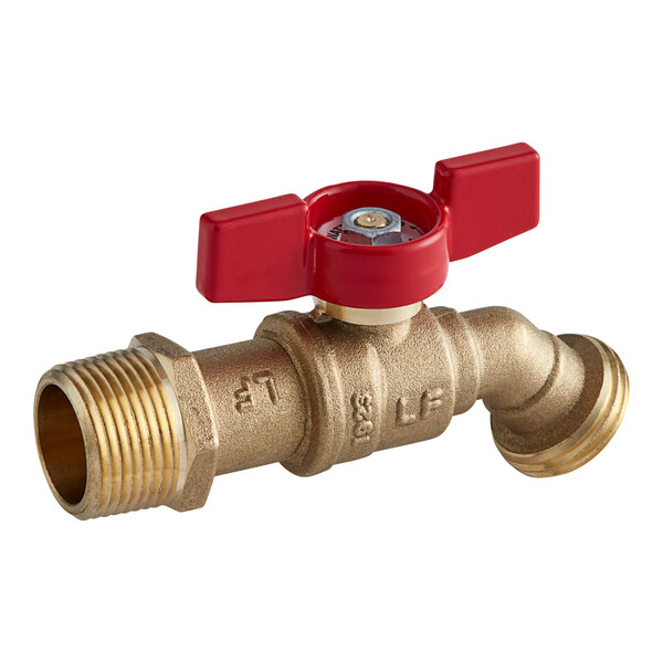 A brass Watts quarter-turn boiler drain valve with a red handle.