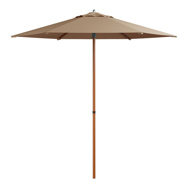 A tan woodgrain Lancaster Table & Seating round umbrella with a woodgrain pole.