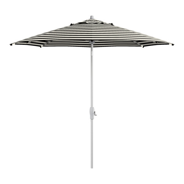 A Lancaster Table & Seating black and white striped umbrella.