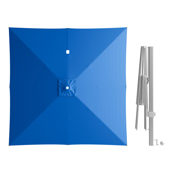 A blue square umbrella with a silver pole.