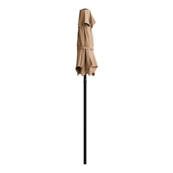 A brown umbrella with a black pole.