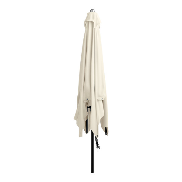 A white umbrella on a black pole.
