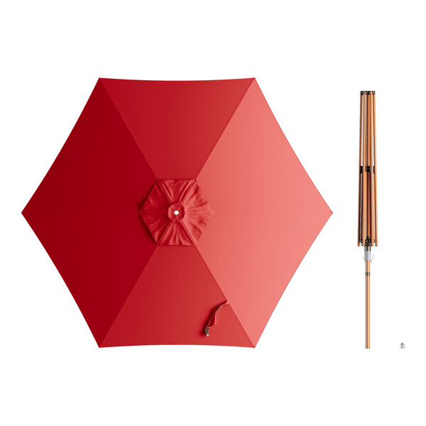 A Lancaster Table & Seating red woodgrain aluminum umbrella with a handle.
