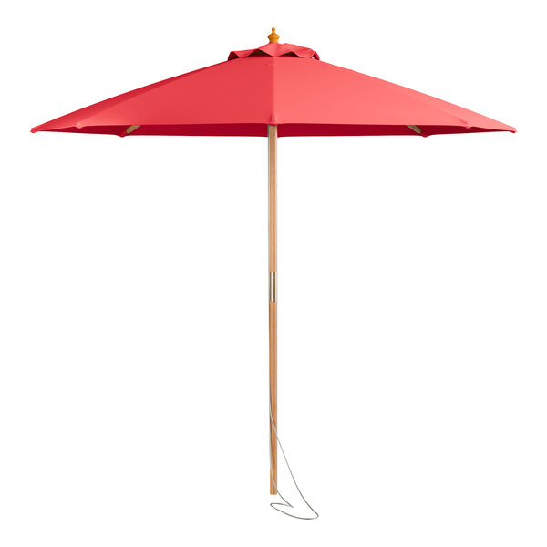 A close-up of a Lancaster Table & Seating round strawberry pulley lift umbrella with a wooden pole and red fabric.