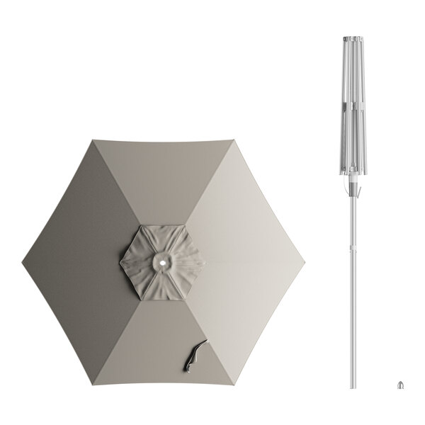 A close-up of a Lancaster Table & Seating silver aluminum umbrella with a hole in the center.