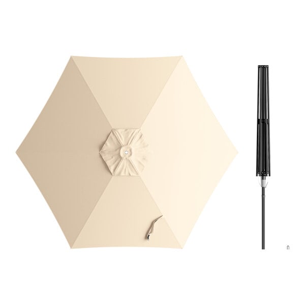 A beige umbrella with a black handle.