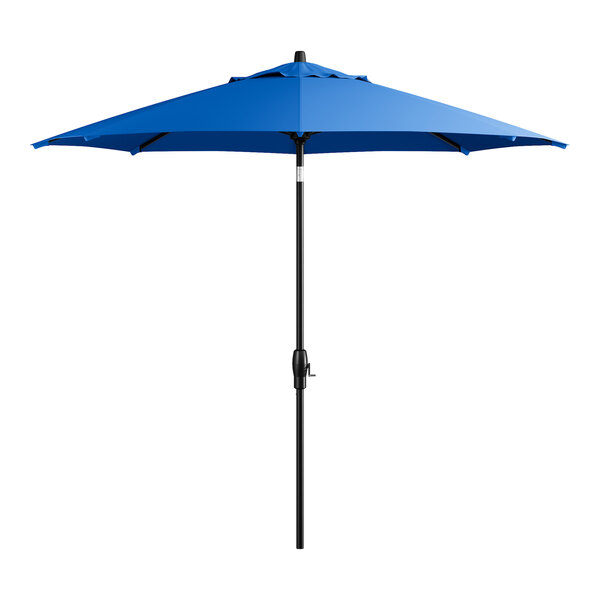 A blue umbrella with a black pole.