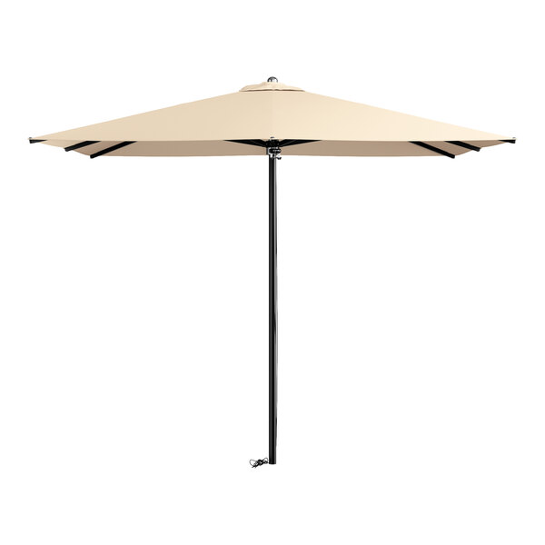 A large beige Lancaster Table & Seating umbrella with a pole.
