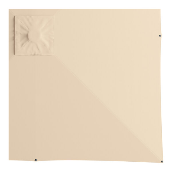 A square white fabric with a Lancaster Table & Seating sand aluminum cantilever umbrella on top.