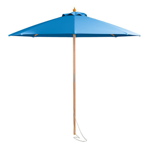 A blue umbrella with a wooden pole and pulley lift.