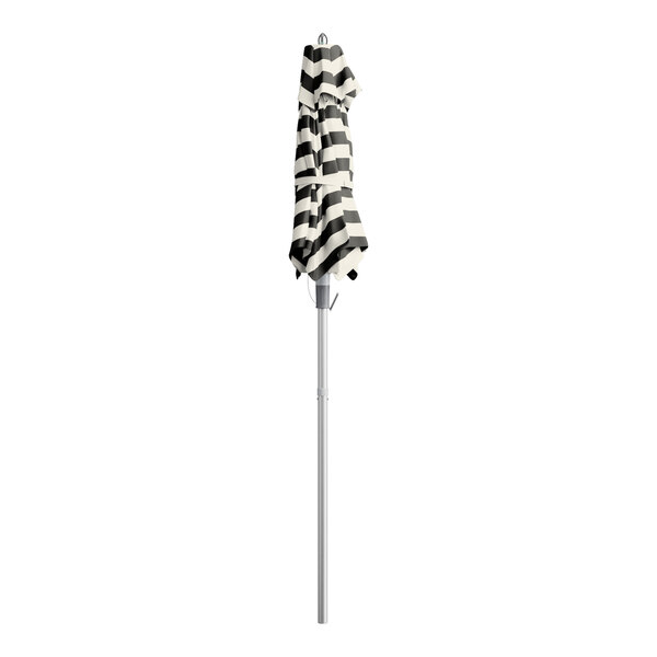 A black and white striped fabric umbrella with a push lift.