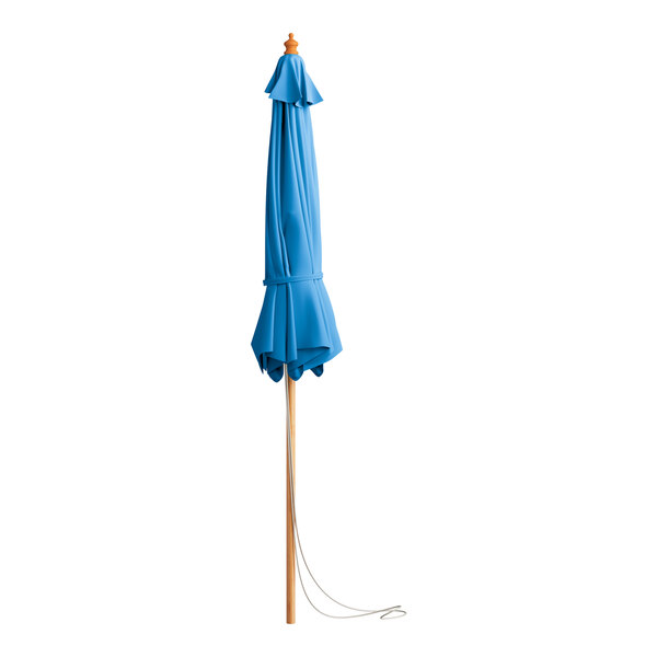 A blue umbrella on a wooden pole.