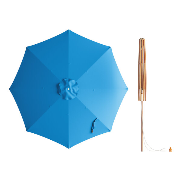 A blue umbrella with a wooden pole and pulley lift.