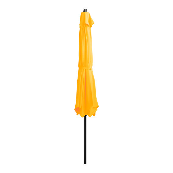 A yellow umbrella on a black pole.