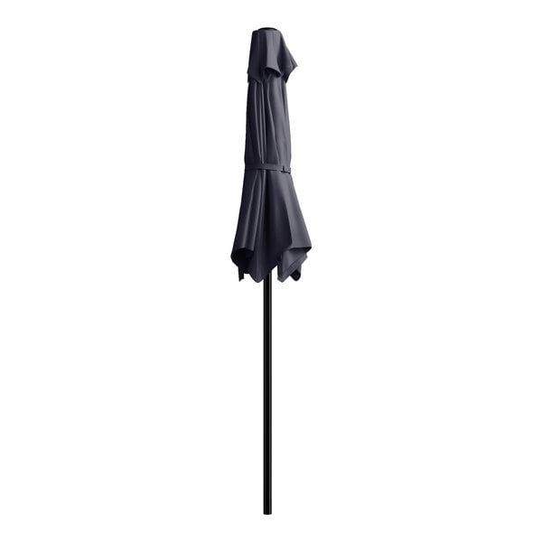 A black umbrella on a black pole with a push lift.