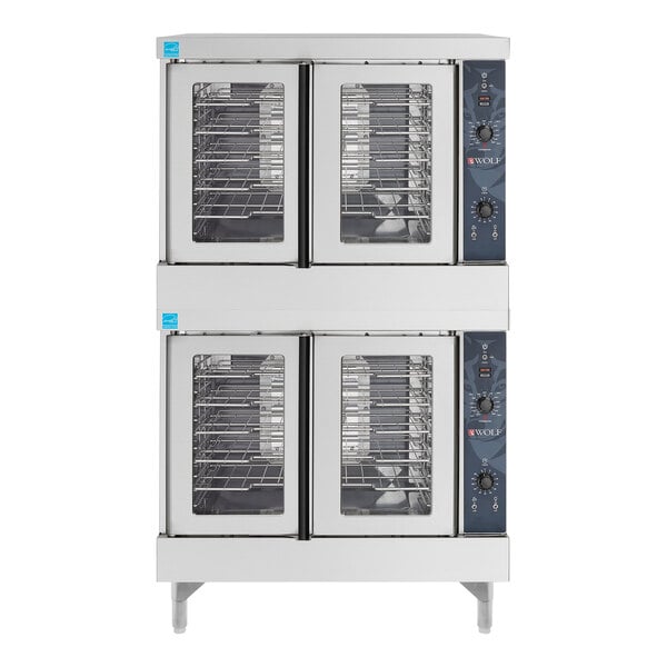 A white Wolf commercial convection oven with two large ovens with doors on top of each other.