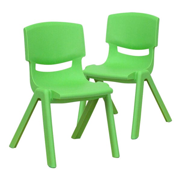 A pair of green plastic Flash Furniture Whitney stackable chairs with legs.