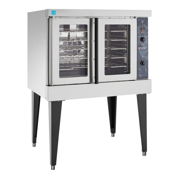 A Wolf natural gas convection oven with two glass doors.