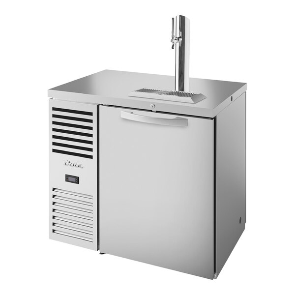 A stainless steel True beer dispenser with a tap.