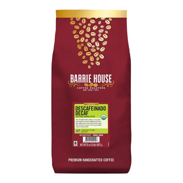 A red and white bag of Barrie House Fair Trade Organic Descafeinado decaf whole bean coffee.