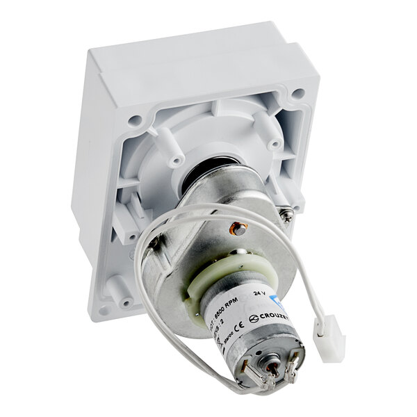 A white Seko detergent motor and roller assembly with a wire.