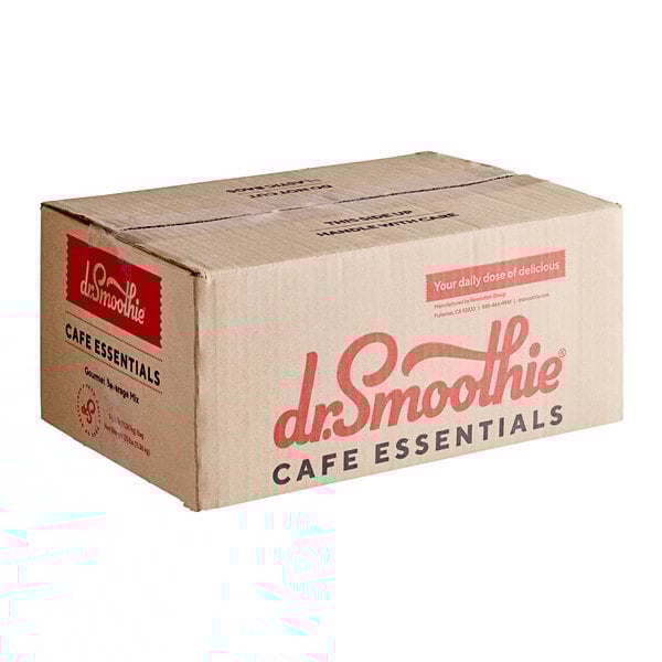 A brown cardboard box of Dr. Smoothie Cafe Essentials Neutral Base Blended Creme Frappe Mix with red text on a counter.