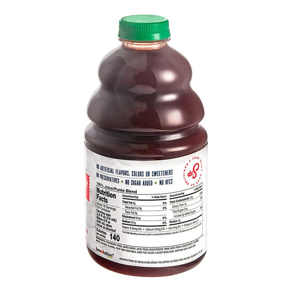 A close up of a bottle of Dr. Smoothie 100% Crushed Strawberry Fruit Smoothie Mix with a green cap.