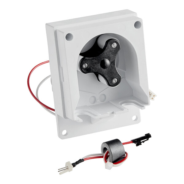 A white plastic box with a white label and a black and red wire connected to a small motor.