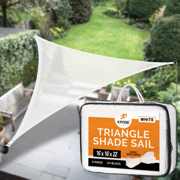A white triangular Xpose Safety shade sail over a patio.