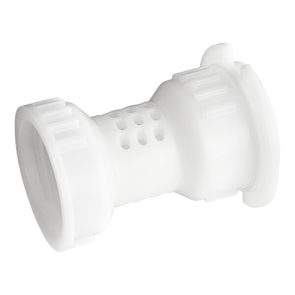 A close-up of a white plastic pipe fitting with a hole in it.