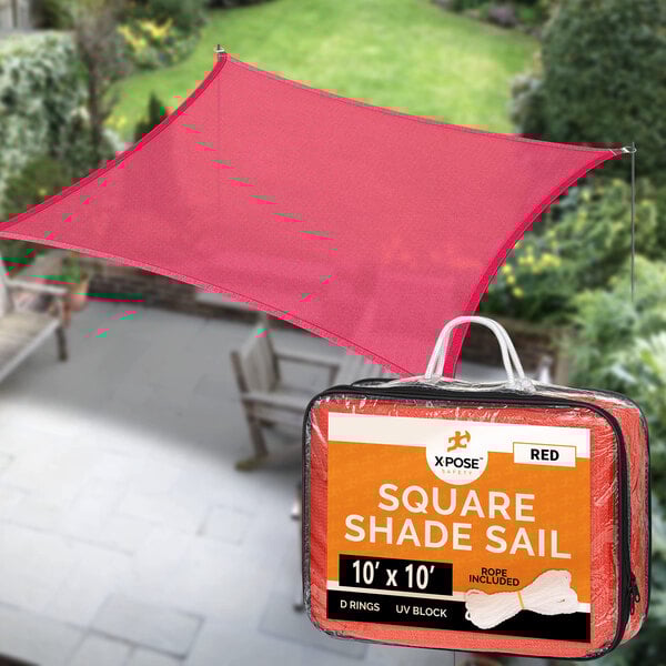 A red square Xpose Safety shade sail with white straps in a bag.