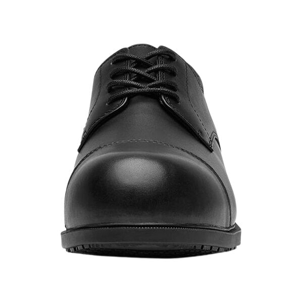A black leather Shoes For Crews Senator dress shoe with laces.