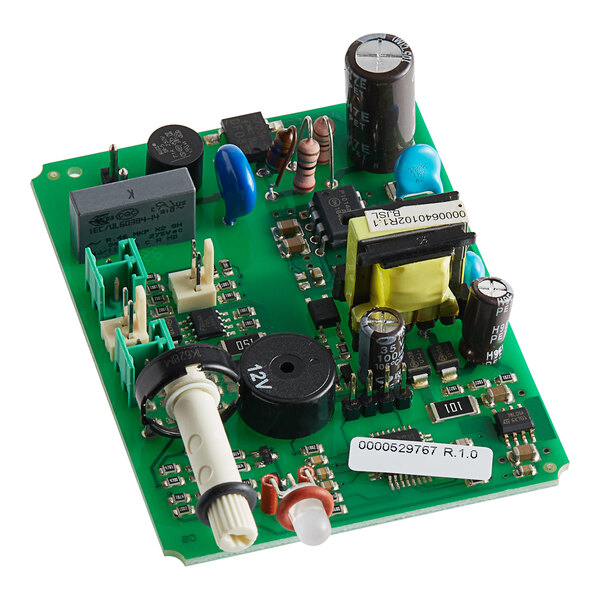A green Seko circuit board with various components on a white background.