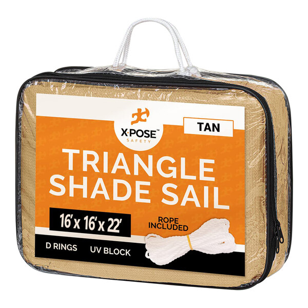 A bag of tan triangular shade sail with Xpose Safety packaging.