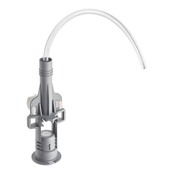 A grey plastic Seko air gap with white plastic tubes attached.