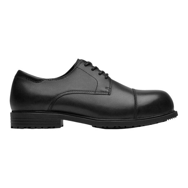 A black leather Shoes For Crews Senator men's dress shoe with a rubber sole.