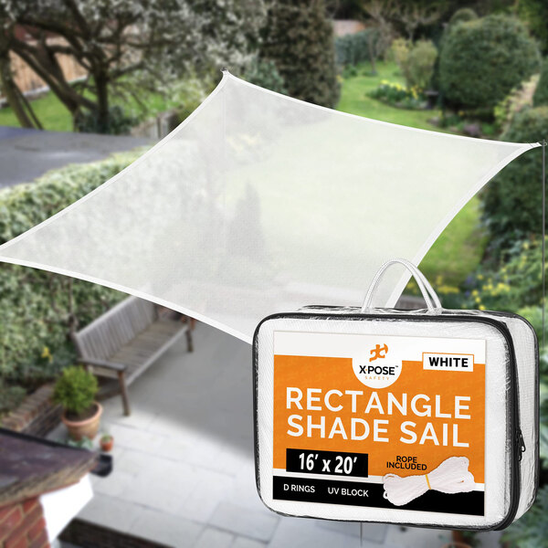 A white rectangular Xpose Safety shade sail over a patio.