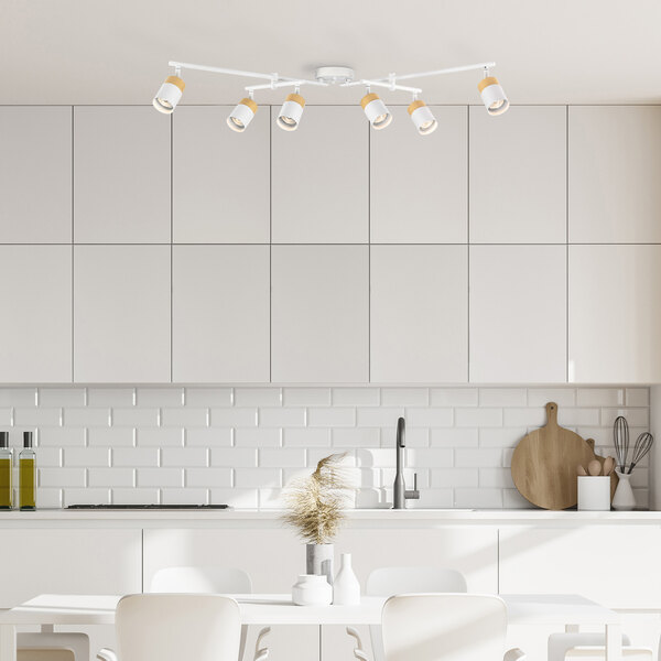 A white kitchen with a Globe 6-Light Hygge Matte White Track Light above a white countertop.