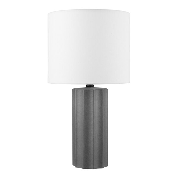 A grey ceramic table lamp with a white shade.